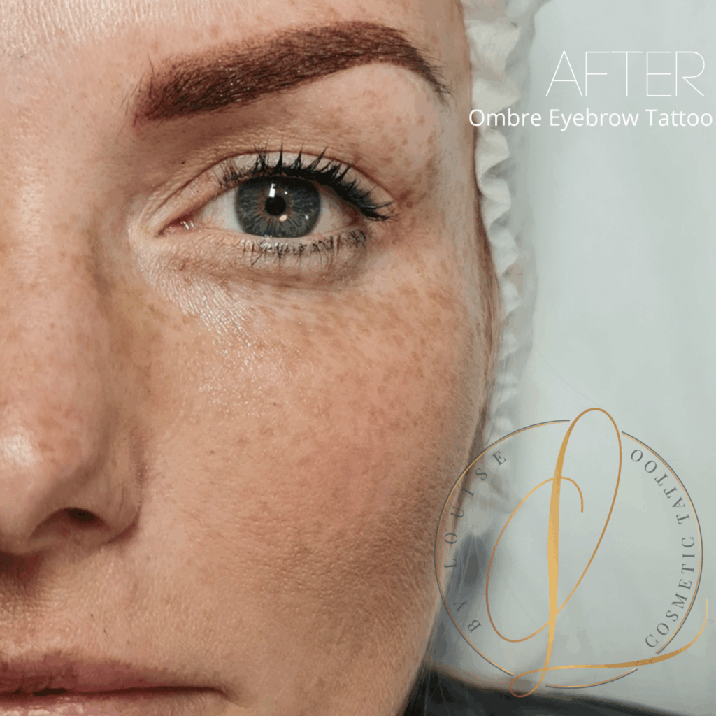 Close-up of a woman's face, specifically her eye and forehead, showing the 'after' result of an ombre eyebrow tattoo.